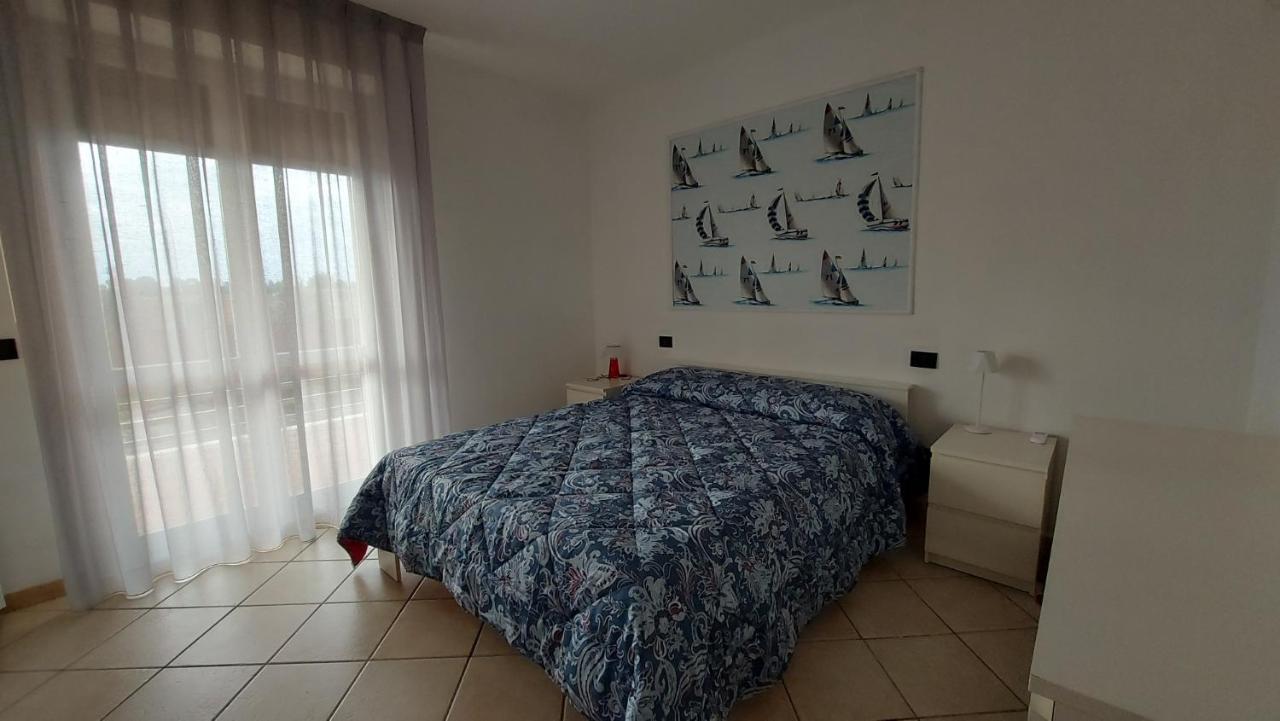 Appartamento Santa Costanza Con Piscina San Vincenzo Luaran gambar